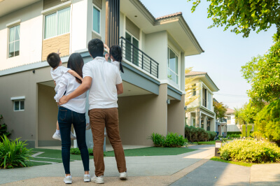 A man and a woman looking to lower their debt to income (DTI) ratio.